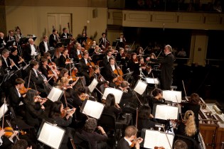 William Boughton conducting; photo by Harold Shapiro