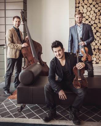Time for Three: Ranaan Meyer, bass; Nick Kendall; and violinist Zach DePue. Photo by LeAnn Mueller.